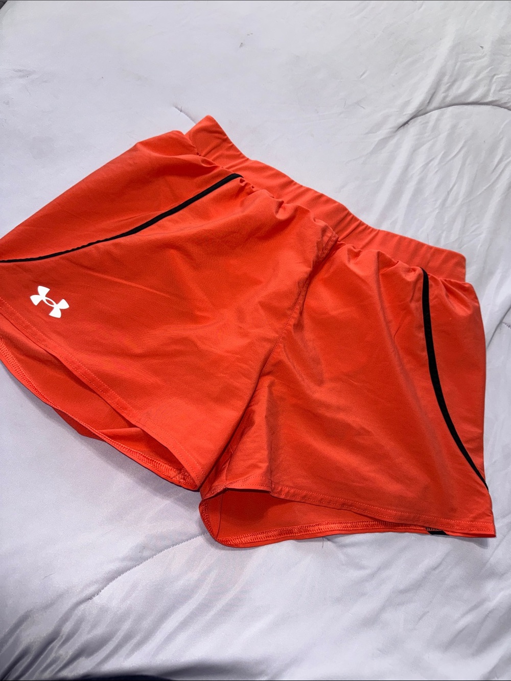 Under Armour Women's Coral Colored Athletic Shorts with Black Trim